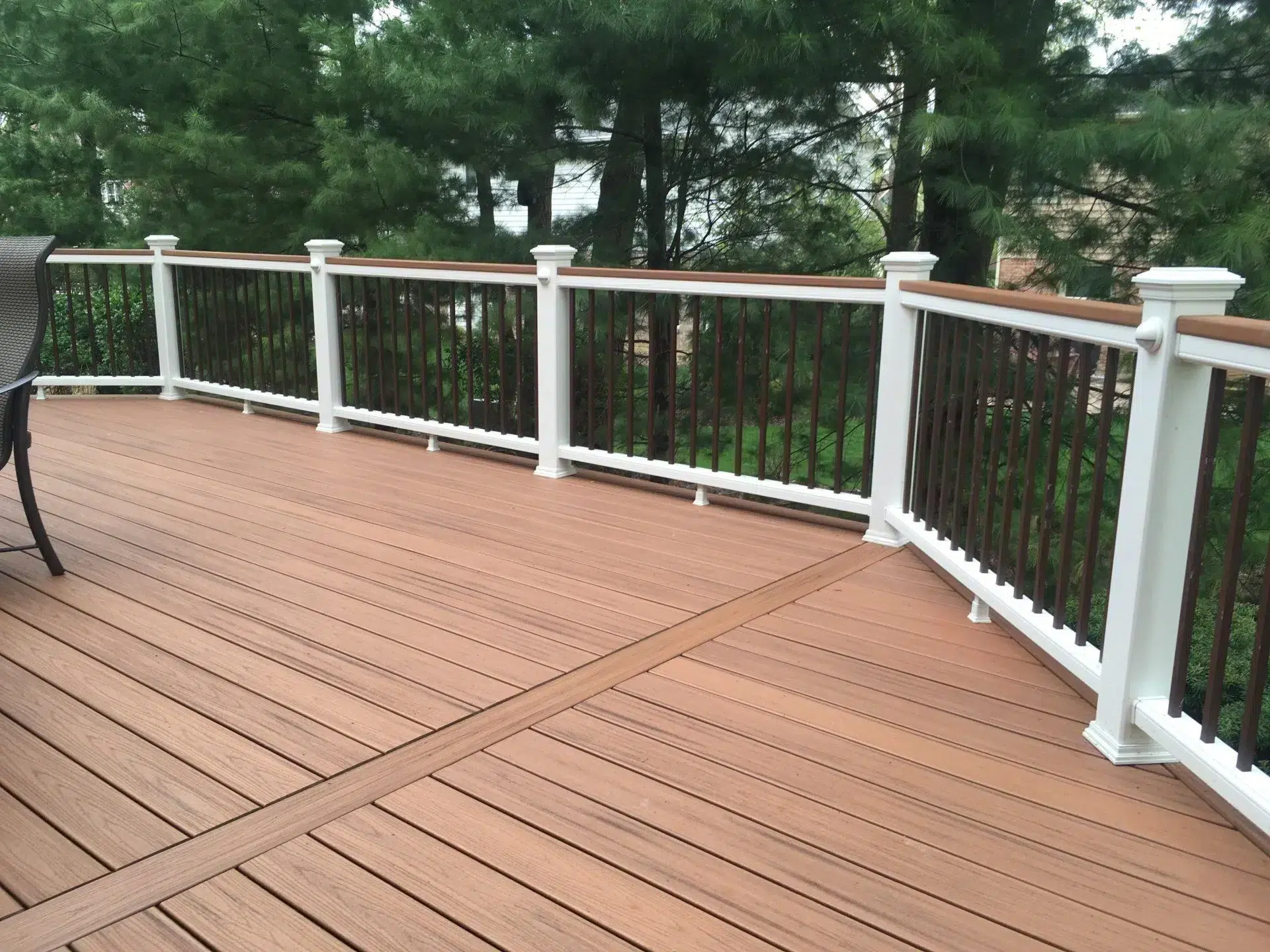 PHoto of a deck with wide deck boards, one of the top deck design trends